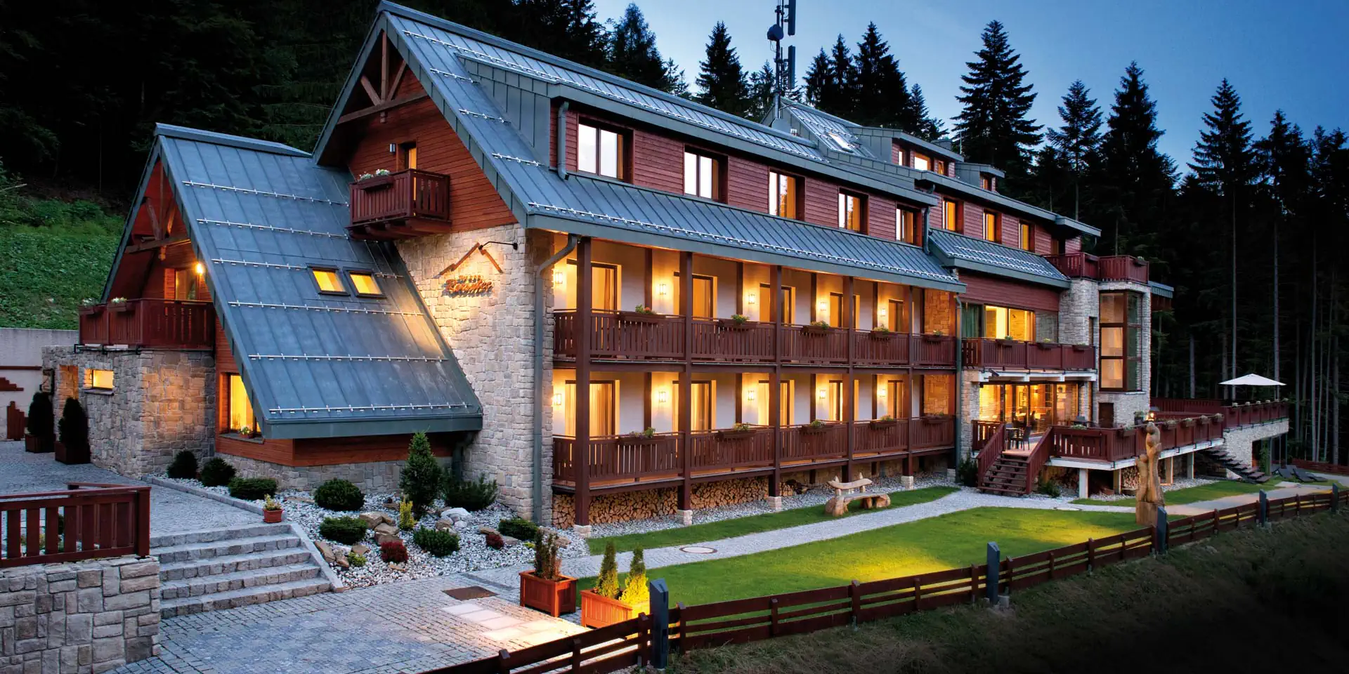 Reel: hotel exterior at night
